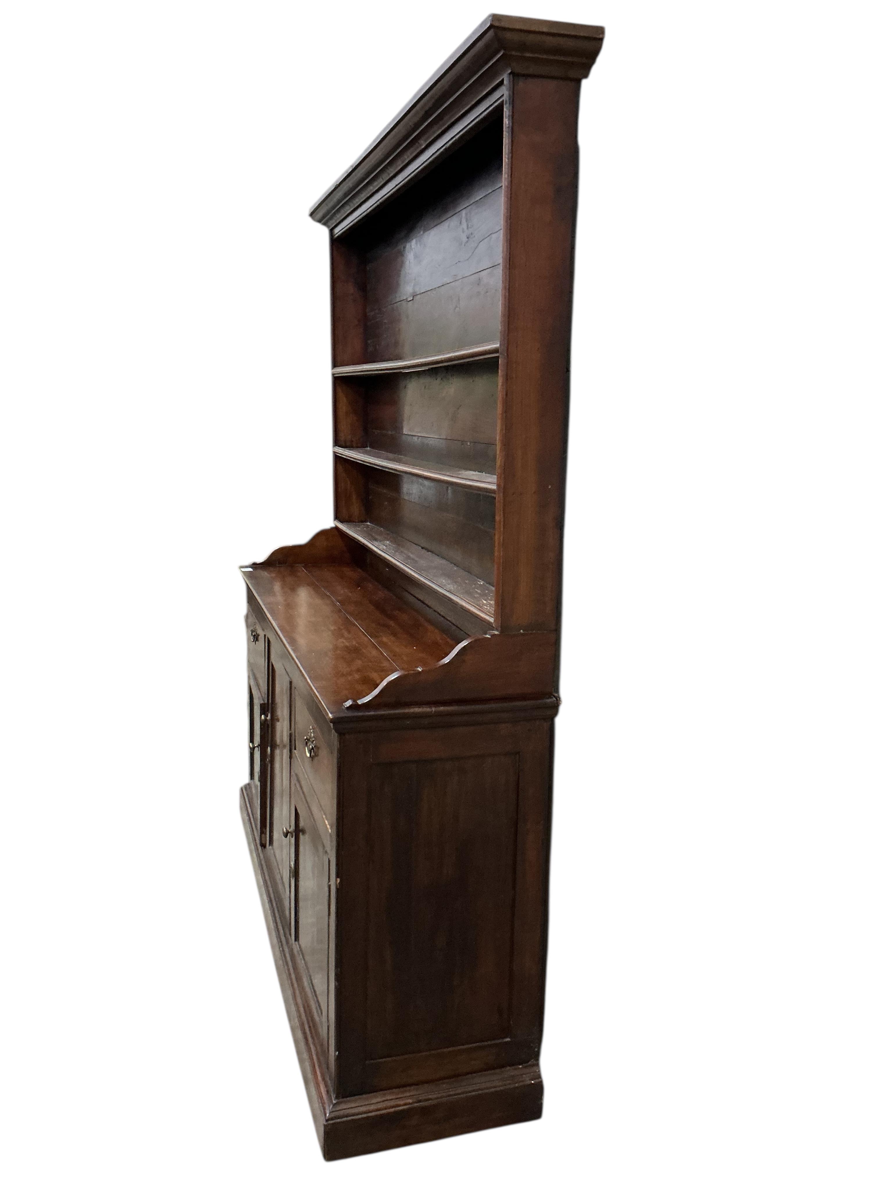 An early 19th century pine and cherry dresser with boarded rack, width 165cm, depth 43cm, height 189cm
